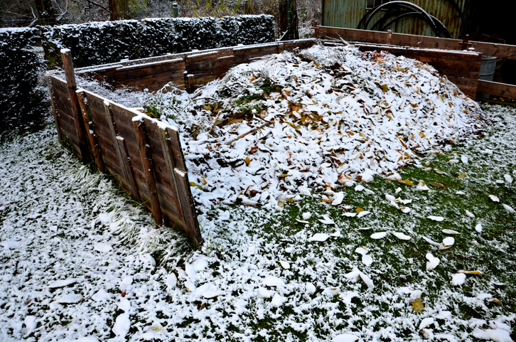 Compost pie covered in snow